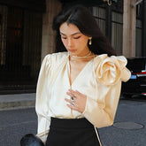 BLUSA DE MANGA LARGA DE LANA DECORADA CON ROSAS